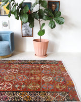 Vintage kilim rug in living room setting, bright colors, wild shaman, soft rug, bold color, Portland, Oregon, rug store, rug shop, local shop, vintage rug, modern kilim, warm colors