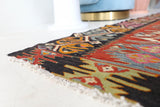 Vintage kilim rug in living room setting, bright colors, wild shaman, soft rug, bold color, Portland, Oregon, rug store, rug shop, local shop, vintage rug, modern kilim, warm colors