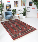 Vintage kilim rug in living room setting, old rug, antique rug, pastel colors, faded colors, Turkish rug, vintage rug, soft rug, Portland, Oregon, rug store, rug shop, local shop, earthy tones, earthy colors, warm colors