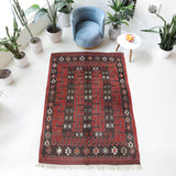 Vintage kilim rug in living room setting, old rug, antique rug, pastel colors, faded colors, Turkish rug, vintage rug, soft rug, Portland, Oregon, rug store, rug shop, local shop, earthy tones, earthy colors, warm colors