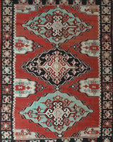 Vintage kilim rug in room decor setting, old rug, antique rug, pastel colors, faded colors, Turkish rug, vintage rug, soft rug, Portland, Oregon, rug store, rug shop, local shop, bold colors, bright colors, faded colors