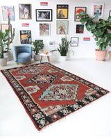 Vintage kilim rug in room decor setting, old rug, antique rug, pastel colors, faded colors, Turkish rug, vintage rug, soft rug, Portland, Oregon, rug store, rug shop, local shop, bold colors, bright colors, faded colors