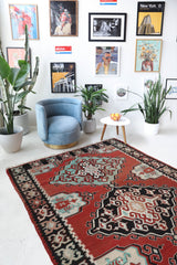 Vintage kilim rug in room decor setting, old rug, antique rug, pastel colors, faded colors, Turkish rug, vintage rug, soft rug, Portland, Oregon, rug store, rug shop, local shop, bold colors, bright colors, faded colors