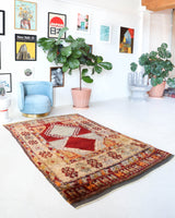 Vintage Turkish rug in a living room setting, pile rug, Turkish rug, vintage rug, portland, rug shop, bright colors, wild shaman, soft rug, bold color, Portland, Oregon, rug store, rug shop, local shop, shag rug, shaggy, plush,tulu rugs