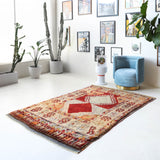 Vintage Turkish rug in a living room setting, pile rug, Turkish rug, vintage rug, portland, rug shop, bright colors, wild shaman, soft rug, bold color, Portland, Oregon, rug store, rug shop, local shop, shag rug, shaggy, plush,tulu rugs