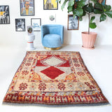 Vintage Turkish rug in a living room setting, pile rug, Turkish rug, vintage rug, portland, rug shop, bright colors, wild shaman, soft rug, bold color, Portland, Oregon, rug store, rug shop, local shop, shag rug, shaggy, plush,tulu rugs