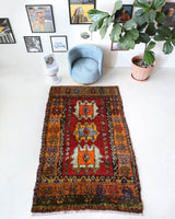 Vintage Turkish rug in a living room setting, pile rug, Turkish rug, vintage rug, portland, rug shop, bright colors, wild shaman, soft rug, bold color, Portland, Oregon, rug store, rug shop, local shop, shag rug, shaggy, plush,tulu rugs