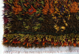 Vintage Turkish rug in a living room setting, pile rug, Turkish rug, vintage rug, portland, rug shop, bright colors, wild shaman, soft rug, bold color, Portland, Oregon, rug store, rug shop, local shop, shag rug, shaggy, plush,tulu rugs