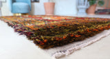 Vintage Turkish rug in a living room setting, pile rug, Turkish rug, vintage rug, portland, rug shop, bright colors, wild shaman, soft rug, bold color, Portland, Oregon, rug store, rug shop, local shop, shag rug, shaggy, plush,tulu rugs