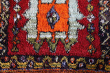 Vintage Turkish rug in a living room setting, pile rug, Turkish rug, vintage rug, portland, rug shop, bright colors, wild shaman, soft rug, bold color, Portland, Oregon, rug store, rug shop, local shop, shag rug, shaggy, plush,tulu rugs