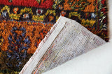 Vintage Turkish rug in a living room setting, pile rug, Turkish rug, vintage rug, portland, rug shop, bright colors, wild shaman, soft rug, bold color, Portland, Oregon, rug store, rug shop, local shop, shag rug, shaggy, plush,tulu rugs