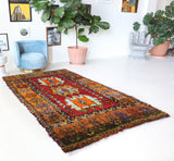 Vintage Turkish rug in a living room setting, pile rug, Turkish rug, vintage rug, portland, rug shop, bright colors, wild shaman, soft rug, bold color, Portland, Oregon, rug store, rug shop, local shop, shag rug, shaggy, plush,tulu rugs