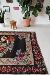 Vintage kilim rug in living room setting, bright colors, wild shaman, soft rug, bold color, Portland, Oregon, rug store, rug shop, local shop, vintage rug, modern kilim, warm colors