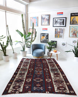 Vintage kilim rug in living room setting, bright colors, wild shaman, soft rug, bold color, Portland, Oregon, rug store, rug shop, local shop, vintage rug, modern kilim, warm colors