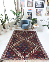 Vintage kilim rug in living room setting, bright colors, wild shaman, soft rug, bold color, Portland, Oregon, rug store, rug shop, local shop, vintage rug, modern kilim, warm colors Vintage kilim rug in living room setting, bright colors, wild shaman, soft rug, bold color, Portland, Oregon, rug store, rug shop, local shop, vintage rug, modern kilim, warm colors