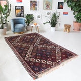 Vintage kilim rug in living room setting, bright colors, wild shaman, soft rug, bold color, Portland, Oregon, rug store, rug shop, local shop, vintage rug, modern kilim, warm colors