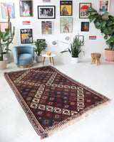 Vintage kilim rug in living room setting, bright colors, wild shaman, soft rug, bold color, Portland, Oregon, rug store, rug shop, local shop, vintage rug, modern kilim, warm colors