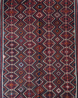 Vintage kilim rug in living room setting, bright colors, wild shaman, soft rug, bold color, Portland, Oregon, rug store, rug shop, local shop, vintage rug, modern kilim, warm colors