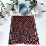 Vintage kilim rug in living room setting, bright colors, wild shaman, soft rug, bold color, Portland, Oregon, rug store, rug shop, local shop, vintage rug, modern kilim, warm colors