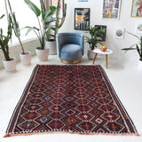 Vintage kilim rug in living room setting, bright colors, wild shaman, soft rug, bold color, Portland, Oregon, rug store, rug shop, local shop, vintage rug, modern kilim, warm colors