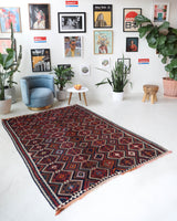 Vintage kilim rug in living room setting, bright colors, wild shaman, soft rug, bold color, Portland, Oregon, rug store, rug shop, local shop, vintage rug, modern kilim, warm colors