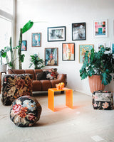 Vintage kilim rug in living room setting, old rug, antique rug, pastel colors, faded colors, Turkish rug, vintage rug, soft rug, Portland, Oregon, rug store, rug shop, local shop, earthy tones, earthy colors, warm colors