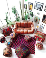 Floor pouf in a living room setting, pillow, turkish pillow, kilim pillow, home decor, decorative pillow, sham, rug pillow, decor, home decor, pouf, floor cushion, cushion, Portland, rugshop, Oregon, Wild Shaman, ottoman