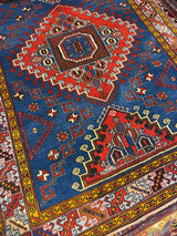 Vintage Turkish rug in a living room setting, pile rug, Turkish rug, vintage rug, portland, rug shop, bright colors, wild shaman, soft rug, bold color, Portland, Oregon, rug store, rug shop, local shop, shag rug, shaggy, plush,tulu rugs