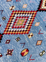 Area rug in a living room setting, pile rug, Turkish rug, custom rug, , new rug, modern rug, customizable rug, made to order rug, portland, rug shop, bright colors, wild shaman, soft rug, bold color, Portland, Oregon, rug store, rug shop, local shop, made in Turkey