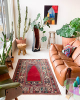 Vintage Turkish rug in a living room setting, pile rug, Turkish rug, vintage rug, portland, rug shop, bright colors, wild shaman, soft rug, bold color, Portland, Oregon, rug store, rug shop, local shop, antique rug