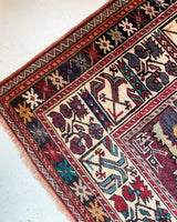 Vintage Turkish rug in a living room setting, pile rug, Turkish rug, vintage rug, portland, rug shop, bright colors, wild shaman, soft rug, bold color, Portland, Oregon, rug store, rug shop, local shop, antique rugVintage Turkish rug in a living room setting, pile rug, Turkish rug, vintage rug, portland, rug shop, bright colors, wild shaman, soft rug, bold color, Portland, Oregon, rug store, rug shop, local shop, antique rug