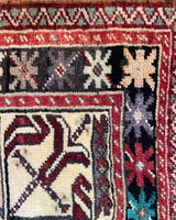 Vintage Turkish rug in a living room setting, pile rug, Turkish rug, vintage rug, portland, rug shop, bright colors, wild shaman, soft rug, bold color, Portland, Oregon, rug store, rug shop, local shop, antique rug