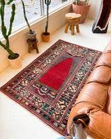 Vintage Turkish rug in a living room setting, pile rug, Turkish rug, vintage rug, portland, rug shop, bright colors, wild shaman, soft rug, bold color, Portland, Oregon, rug store, rug shop, local shop, antique rug