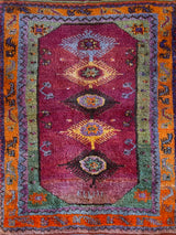 Vintage Turkish rug in a living room setting, pile rug, Turkish rug, vintage rug, portland, rug shop, bright colors, wild shaman, soft rug, bold color, Portland, Oregon, rug store, rug shop, local shop, antique rug