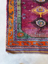 Vintage Turkish rug in a living room setting, pile rug, Turkish rug, vintage rug, portland, rug shop, bright colors, wild shaman, soft rug, bold color, Portland, Oregon, rug store, rug shop, local shop, antique rug