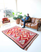 old rug, antique rug, Turkish rug, Portland, Oregon, rug store, rug shop, local shop, bright colors, wild shaman, large rug, area rug, red rug, bold color, burgundy, dark red