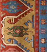 Vintage Turkish rug in a living room setting, pile rug, Turkish rug, vintage rug, portland, rug shop, bright colors, wild shaman, soft rug, bold color, Portland, Oregon, rug store, rug shop, local shop, antique rug,