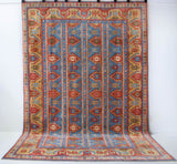 Vintage Turkish rug in a living room setting, pile rug, Turkish rug, vintage rug, portland, rug shop, bright colors, wild shaman, soft rug, bold color, Portland, Oregon, rug store, rug shop, local shop, antique rug,