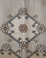 Area rug in a living room setting, pile rug, Turkish rug, old rug, antique rug, pastel colors, faded colors, Turkish rug, vintage rug, soft rug, Portland, Oregon, rug store, rug shop, local shop, pastel colors, warm colors