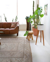 Vintage Turkish rug in living room setting, old rug, antique rug, pastel colors, faded colors, Turkish rug, vintage rug, soft rug, Portland, Oregon, rug store, rug shop, local shop