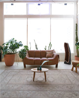 Vintage Turkish rug in living room setting, old rug, antique rug, pastel colors, faded colors, Turkish rug, vintage rug, soft rug, Portland, Oregon, rug store, rug shop, local shop