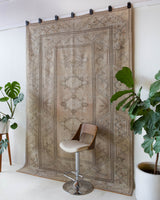 Vintage Turkish rug in living room setting, old rug, antique rug, pastel colors, faded colors, Turkish rug, vintage rug, soft rug, Portland, Oregon, rug store, rug shop, local shop