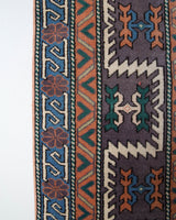 Vintage Turkish rug in living room setting, old rug, antique rug, pastel colors, faded colors, Turkish rug, vintage rug, soft rug, Portland, Oregon, rug store, rug shop, local shop, pastel colors