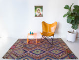 Vintage kilim rug in living room setting, bright colors, wild shaman, soft rug, bold color, Portland, Oregon, rug store, rug shop, local shop, vintage rug, modern kilim, warm colors