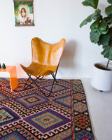 Vintage kilim rug in living room setting, bright colors, wild shaman, soft rug, bold color, Portland, Oregon, rug store, rug shop, local shop, vintage rug, modern kilim, warm colors