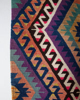 Vintage kilim rug in living room setting, bright colors, wild shaman, soft rug, bold color, Portland, Oregon, rug store, rug shop, local shop, vintage rug, modern kilim, warm colors