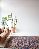 Vintage kilim rug in living room setting, bright colors, wild shaman, soft rug, bold color, Portland, Oregon, rug store, rug shop, local shop, vintage rug, modern kilim, warm colors