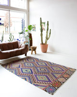 Vintage kilim rug in living room setting, bright colors, wild shaman, soft rug, bold color, Portland, Oregon, rug store, rug shop, local shop, vintage rug, modern kilim, warm colors