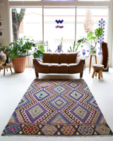 Vintage kilim rug in living room setting, bright colors, wild shaman, soft rug, bold color, Portland, Oregon, rug store, rug shop, local shop, vintage rug, modern kilim, warm colors