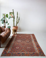 Vintage kilim rug in living room setting, bright colors, wild shaman, soft rug, bold color, Portland, Oregon, rug store, rug shop, local shop, vintage rug, modern kilim, warm colors